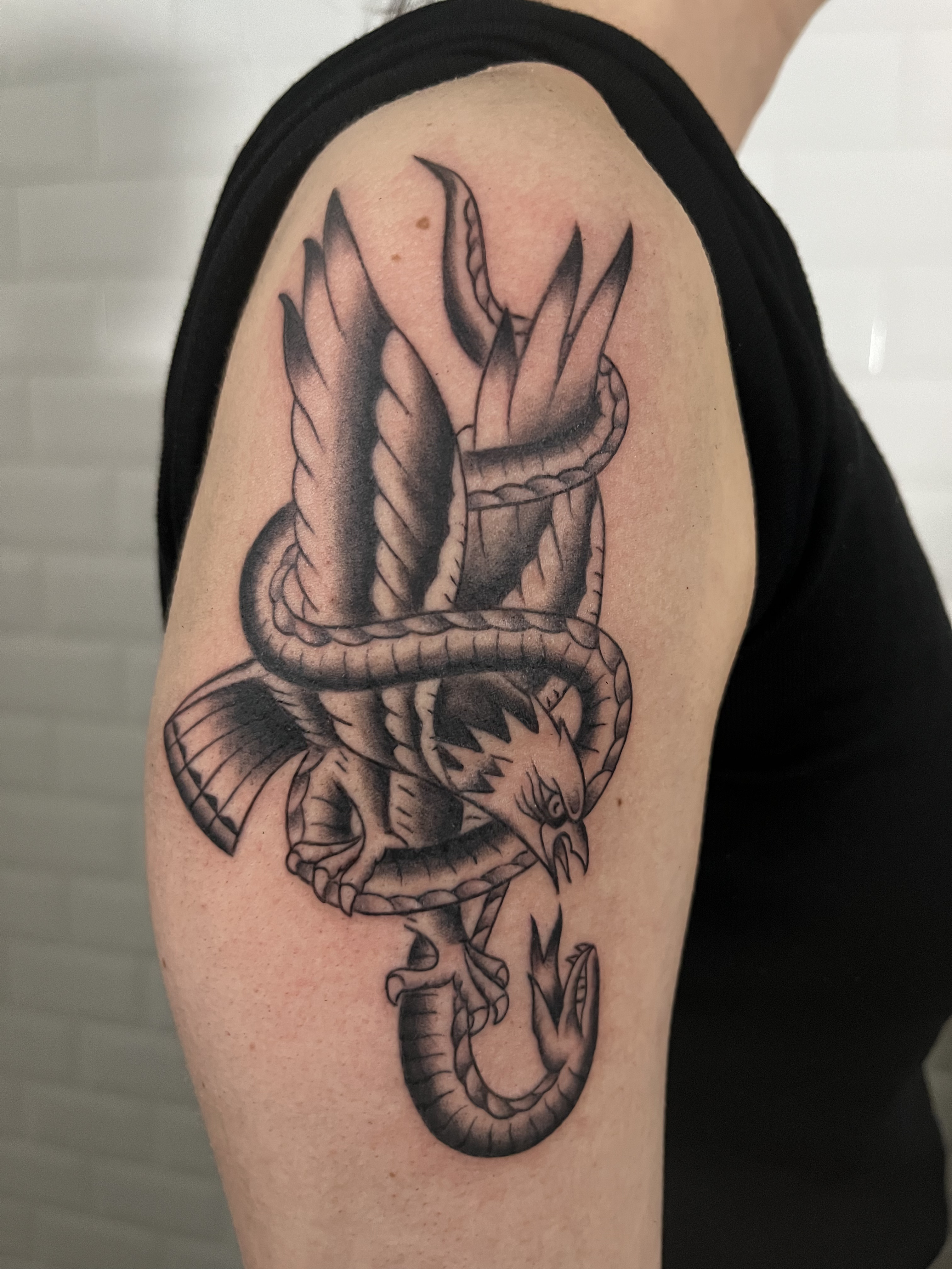 Eagle and snake tattoo